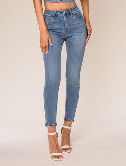 Jean 7/8 slim bords asymétriques - bleu denim