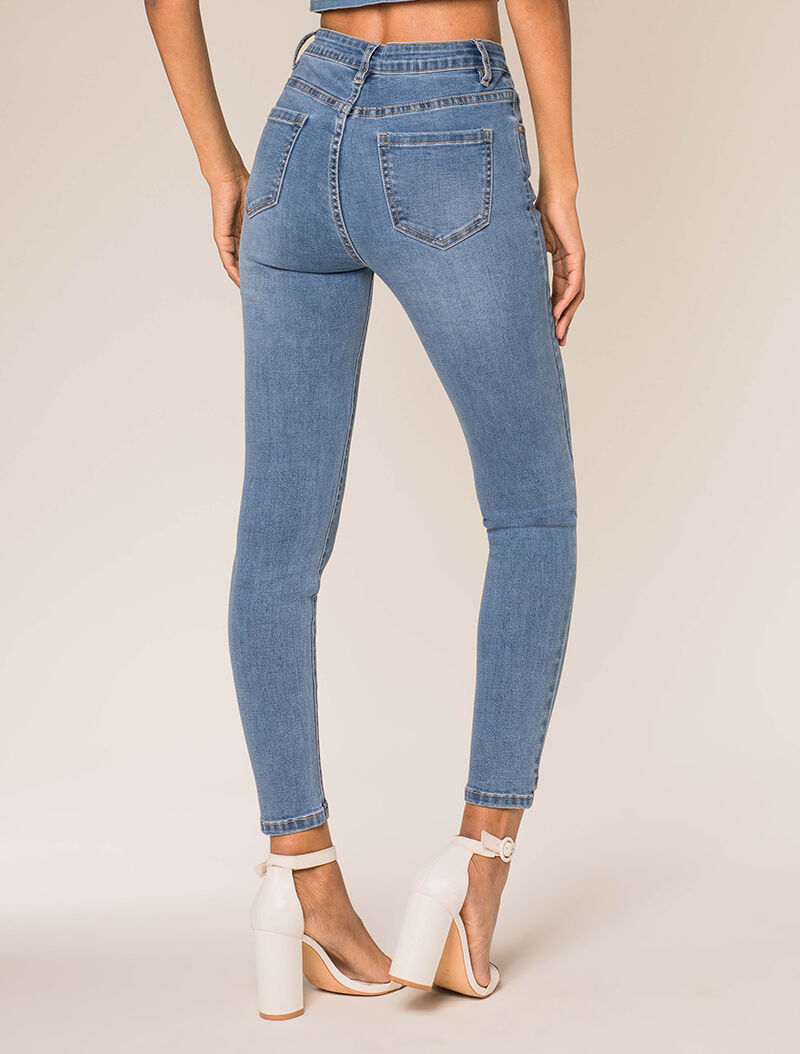 Jean 7/8 slim bords asymétriques - bleu denim