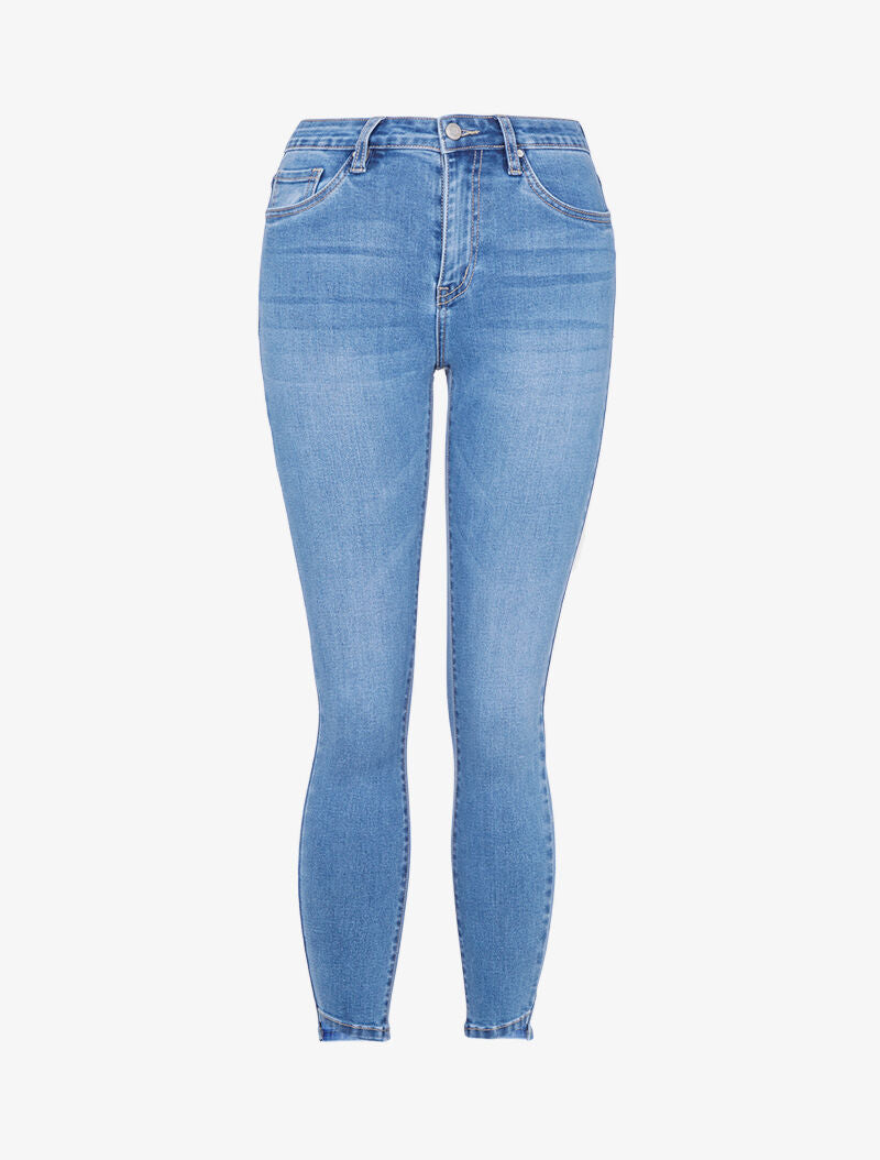 Jean 7/8 slim bords asymétriques - bleu denim