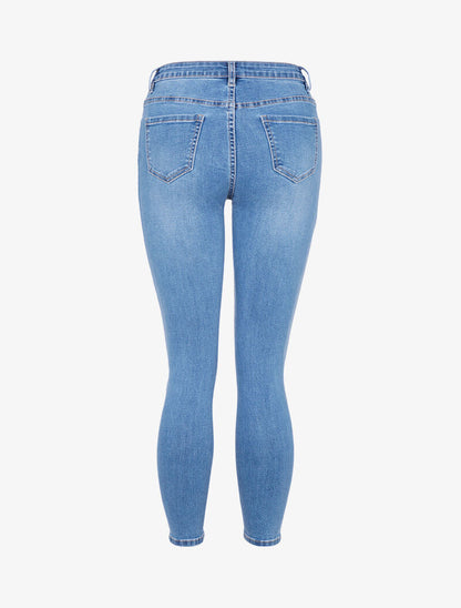Jean 7/8 slim bords asymétriques - bleu denim
