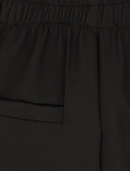 Pantalon slim à boutons stylisés - Noir - 3